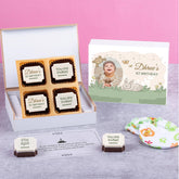Flat-lay of printable 1st birthday invitations sample with 4 chocolates
